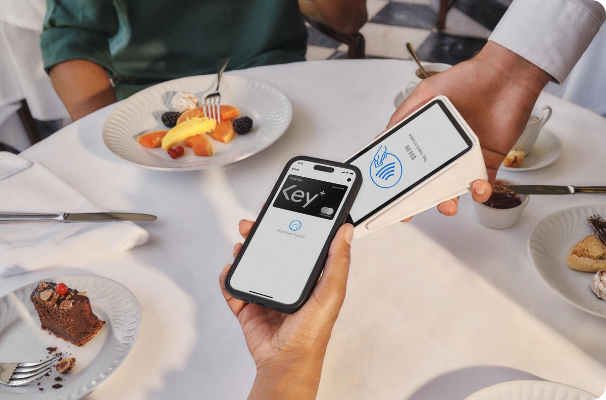 Mobile One Key Mastercard being used at a restaurant